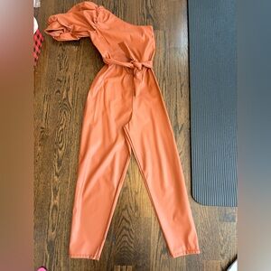 ASOS faux leather jumpsuit with tie waist, one puff shoulder, size  US 6